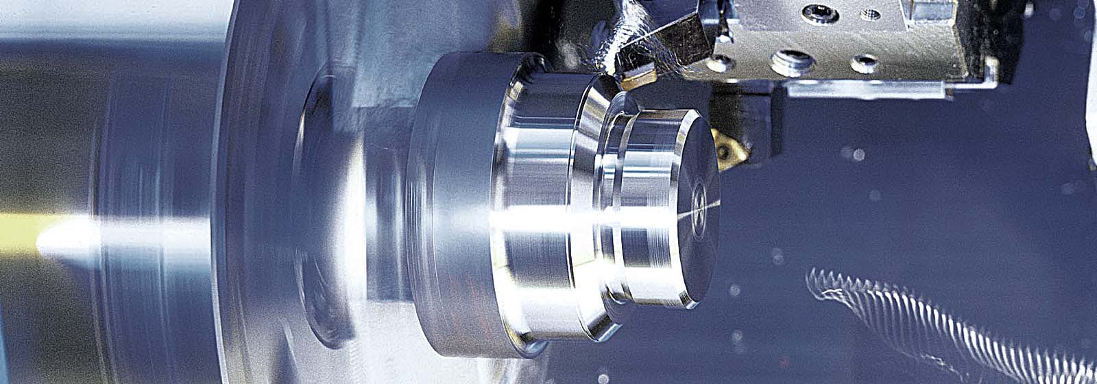CNC machine turning metal workpiece