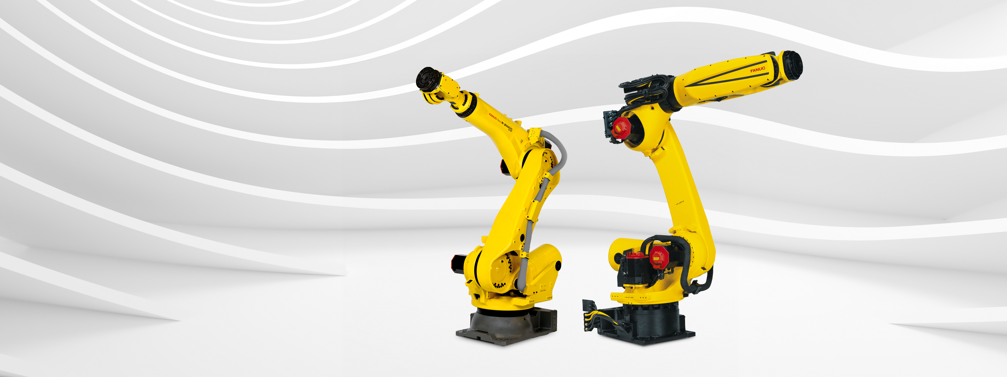 7 R-2000 industrial robots in industry hall